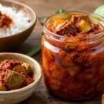 How much sodium is in a typical serving of Andhra pickle?